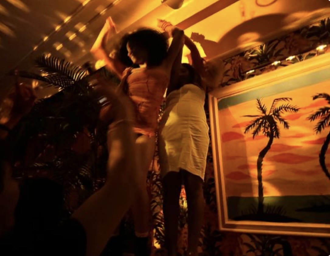 Dancers under warm lights